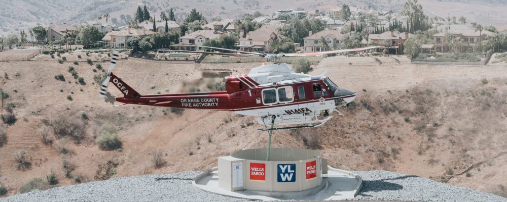 OCFA helicopter lowering snorkel into wells fargo Heli-hydrant OCFA helicopter lowering snorkel into wells fargo Heli-hydrant